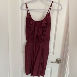 Maroon game day sleeveless dress. Ruffle detail. Cinched waist. Pockets. Size S.
